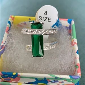 Beautiful emerald green colored stone ring